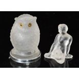 A 1930s glass figure in the manner of Sevres depicting a seated nude female in a frosted clear