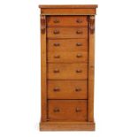 A Victorian mahogany Wellington chest of seven graduated drawers,