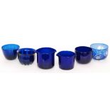 A 19th Century Bristol blue glass rinser of tapering from with basal slice cutting,