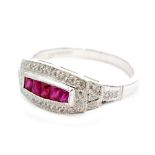 A contemporary 18ct hallmarked white gold ruby and diamond ring,