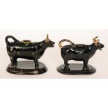 Two 19th Century Jackfield type cow creamers,