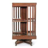 An early 20th Century mahogany revolving bookcase,