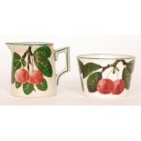 A small early 20th Century Wemyss cream jug and sugar bowl,