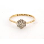 An early 20th Century 18ct diamond daisy cluster ring,