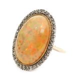 An 18ct gold opal and diamond ring,