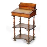 A Victorian three tier marquetry inlaid writing desk,