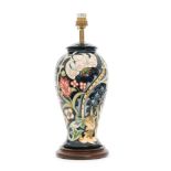 A Moorcroft Pottery table lamp decorated in the Golden Lily pattern designed by Rachel Bishop,