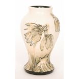 A small Moorcroft Pottery vase of inverted baluster form decorated in the Coneflower pattern