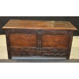 An 18th Century and later carved oak mule chest,