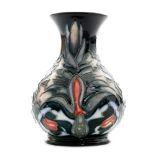 A Moorcroft Pottery vase decorated in the Snakeshead pattern (from the William Morris Centenary