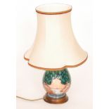 A Moorcroft Pottery table lamp decorated in the Mamoura pattern designed by Sally Tuffin,