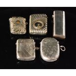 Five assorted 19th Century and later vesta cases, three silver,