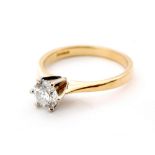 An 18ct solitaire diamond ring, round brilliant cut stone claw set to a plain tapering band,