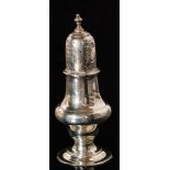 A George III hallmarked silver caster of baluster form with engraved lion crest pierced pull off