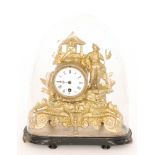 A small 19th French pressed gilt metal mantle clock and dome,