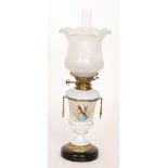 A Victorian brass oil lamp and shade with transfer panel of a girl wearing a headress on gilt and