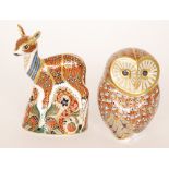Two Royal Crown Derby paperweights comprising an owl and a fawn, made for the Collectors Guild,