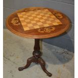 A Victorian mahogany occasional games table of circular form,
