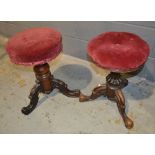 Two Victorian revolving piano stools each upholstered in crimson and pink plush, on tripod legs.