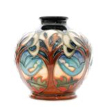 A Moorcroft Pottery vase of ovoid form decorated in the Blue Dove pattern designed by Kerry Goodwin,