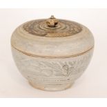 A 14th Century South East Asian Sawankhalok underglazed black ware circular box and cover,