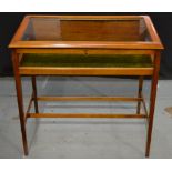 A late 20th Century mahogany bijoiterie table or vitrine of rectangular form,