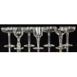A set of four early 20th Century hollow stem Champagne glasses,