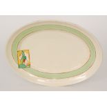 A large 1930s Clarice Cliff meat plate decorated in the Stroud pattern,