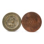 A 19th Century brass snuff box of circular form,