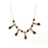 An amethyst and diamond fringe necklace in the Arts and Crafts taste,