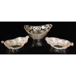 A pair of Edwardian pierced and embossed boat shaped sweetmeat dishes, Sheffield 1901,