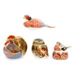 Four assorted Royal Crown Derby paperweights comprising an owl, pheasant,