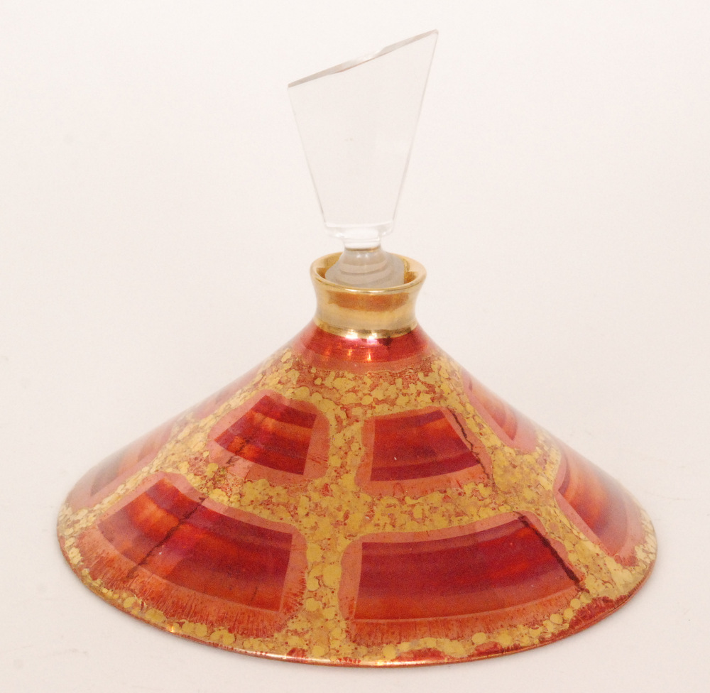 A contemporary Atkinson-Jones Lustreware perfume bottle of conical form decorated in a red and gold