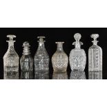 A group of six 19th Century and later clear glass decanters comprising an example with a diamond