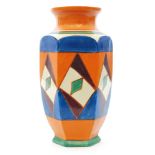 A Clarice Cliff Original Bizarre shape 38 vase of footed hexagonal form with flared collar neck