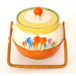 A Clarice Cliff Crocus pattern shape 335 biscuit barrel circa 1930 hand painted with Crocus sprays