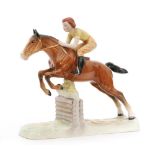 A Beswick Pottery figure of a Girl on a Jumping Horse, model 939, circle mark, height 25cm.