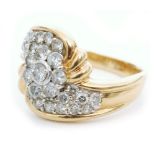 A modern 18ct hallmarked diamond cluster ring,