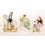 Three 19th Century Staffordshire flatback figures depicting the royal children comprising one stood