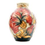 A contemporary Moorcroft Pottery vase decorated in the Spanish pattern painted by Wendy Mason,