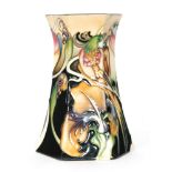 A boxed Moorcroft Pottery hexagonal vase decorated in the Fleur-de-Luce pattern designed by Emma