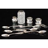 A small parcel lot of assorted silver and white metal items to include a miniature cream jug,