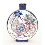 A small Royal Copenhagen moonflask vase decorated to each face with a hand painted stylised bird by