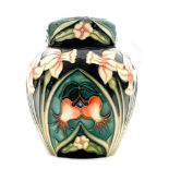 A Moorcroft Pottery ginger jar and cover decorated in the Carousel pattern designed by Rachel