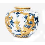 A Chinese dragon jar or vase of ovoid form decorated in blue and white with a gilt metal overlay,