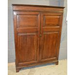 A George III oak and mahogany crossbanded cupboard,