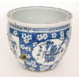 A late 19th to early 20th Century Chinese jardiniere decorated with cartouche panels painted with