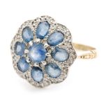 A later 20th Century 18ct sapphire and diamond target cluster ring,
