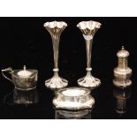 A pair of hallmarked silver trumpet bud vases, heights 14cm, London 1907,