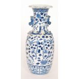 A late 19th Century Chinese blue and white vase decorated with flowers and birds,